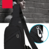 black crossbody sling bag, waterproof travel chest bag,unisex sling bag for daily use, minimalist crossbody bag men women, thetrendhood.com, shoulder chest pack with earphone port, compact sling backpack for travel