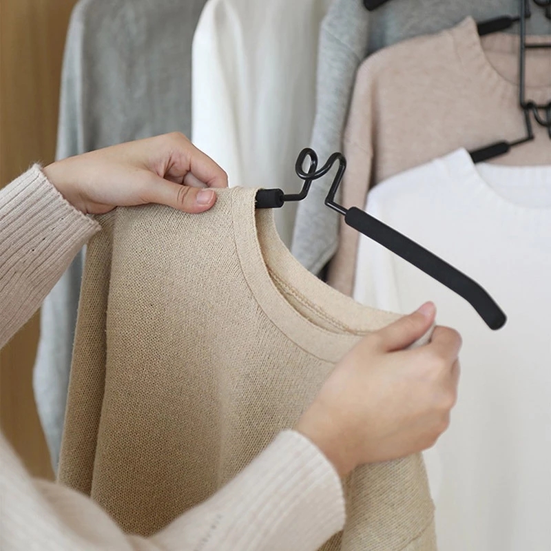 space saving hanger, multi-layer clothes hanger, metal closet organizer, 5-tier hanger, non-slip clothing hanger, wardrobe space saver, collapsible hanger rack, vertical clothes hanger, durable coat hanger, smart closet storage, thetrendhood.com