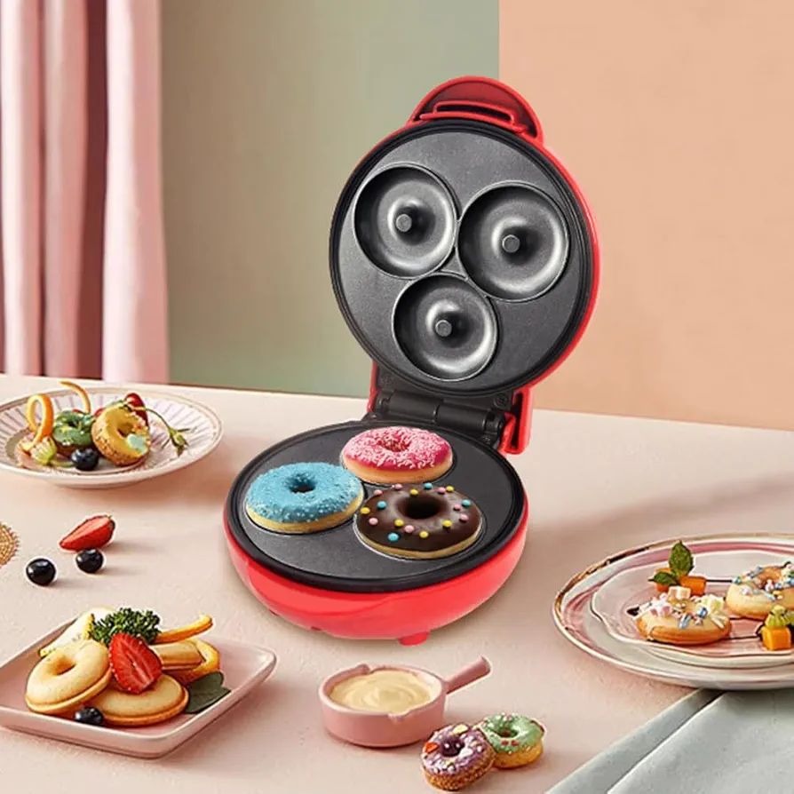 electric donut maker, mini donut machine, non-stick donut maker, homemade donut baker, portable kitchen appliance, breakfast dessert maker, quick donut maker, compact donut baker, donut maker for home, easy bake donut machine, thetrendhood.com