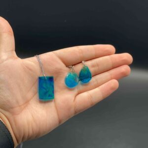 Handmade Resin Jewelry, Blue Resin Earrings and Pendant, Artistic Jewelry for Women, Ocean-Inspired Jewelry, Handmade Locket Set, Lightweight Earrings Set, Fashion Jewelry Gift for Her, Resin Necklace and Earrings, Stylish Women’s Jewelry, Unique Handmade Accessories, Elegant Jewelry for Daily Wear, Resin Jewelry Pakistan