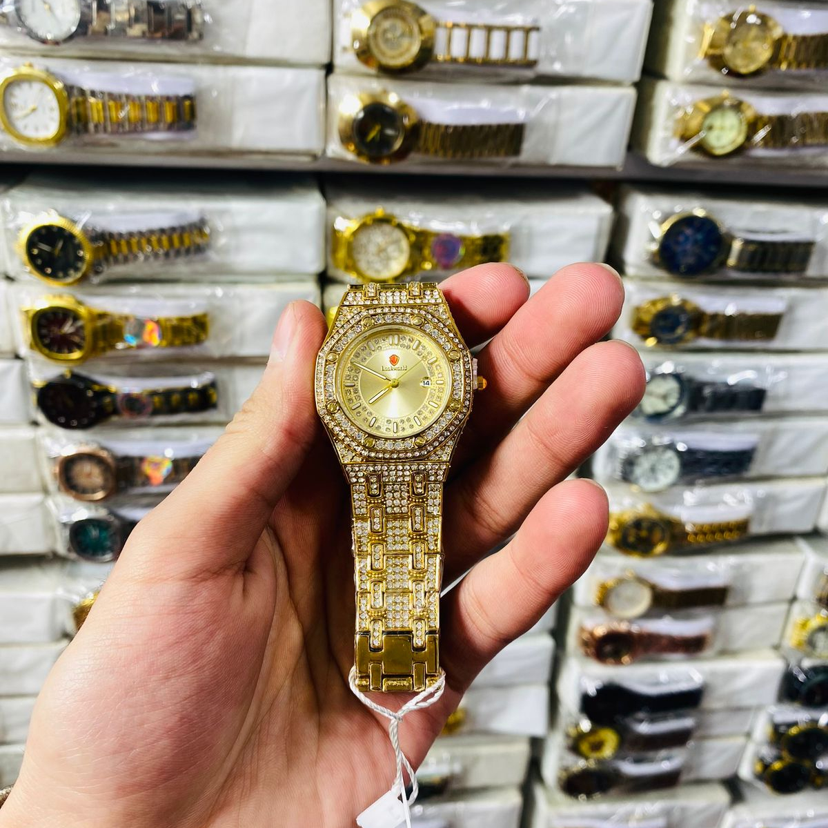 luxury gold watch, diamond studded wrist watch, crystal bezel watch, unisex gold watch, quartz fashion watch, iced out designer watch, gold plated wrist watch, party wear watch for men women, stylish metal chain watch, water resistant fashion watch, affordable luxury watch, gift watch for him her, thetrendhood.com